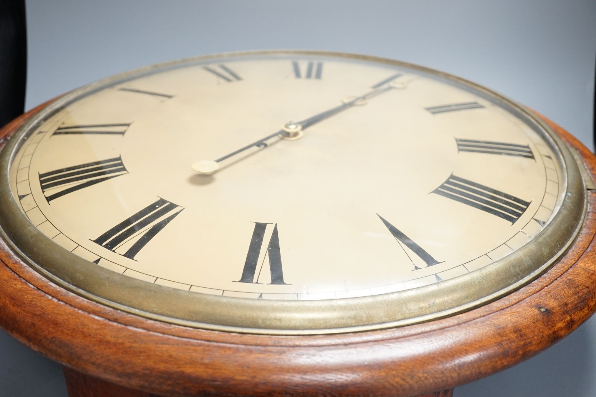 A large Victorian oak-cased dial clock, 56 cms diameter.